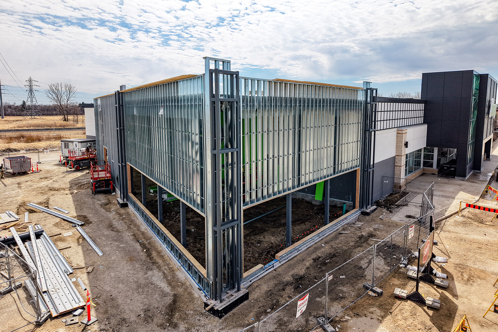1148 Taylor - New Construction - Stud framing and storefront openings at the corner