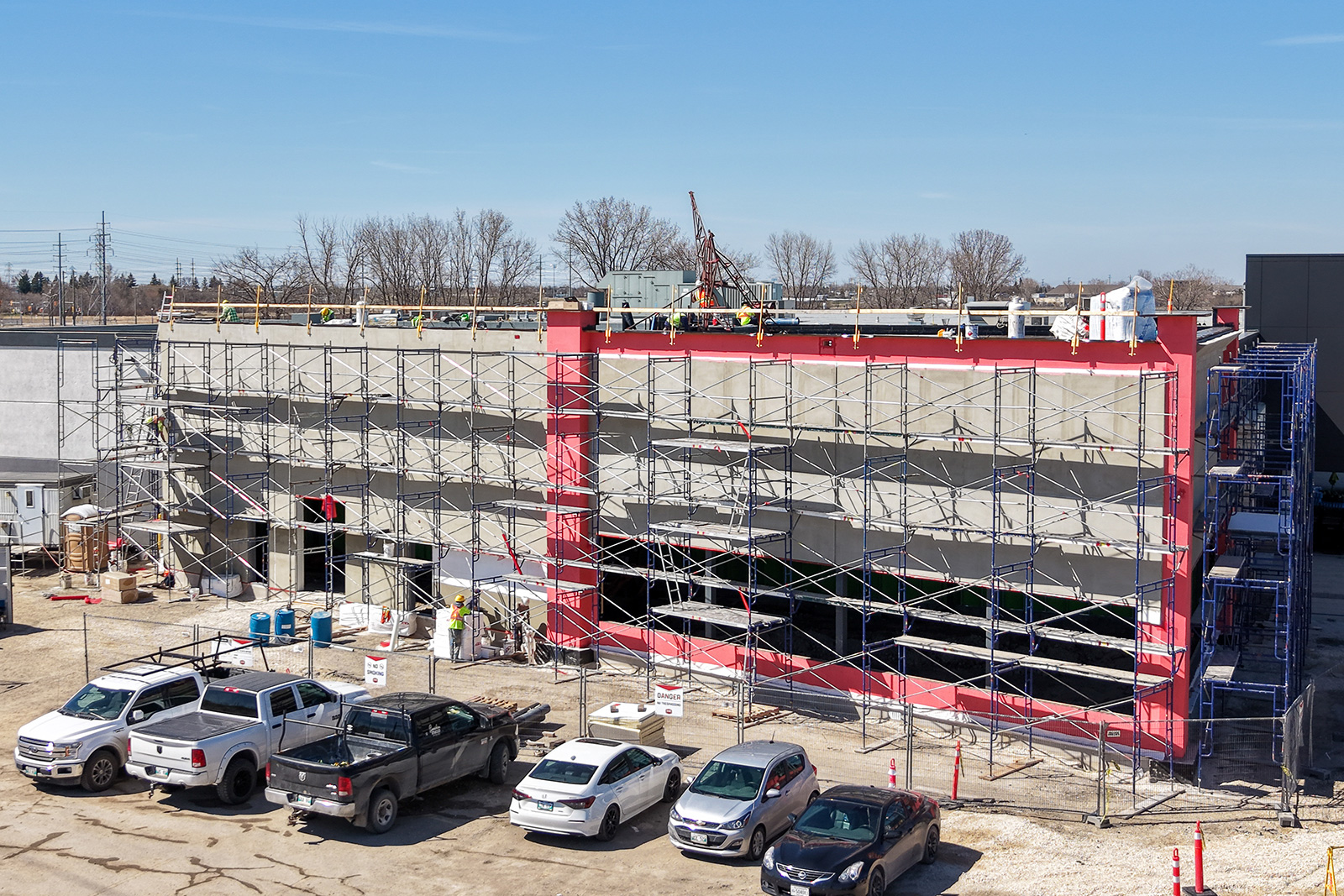 1148 Taylor - New Construction - Sheathing and EIFS base coat on scaffold