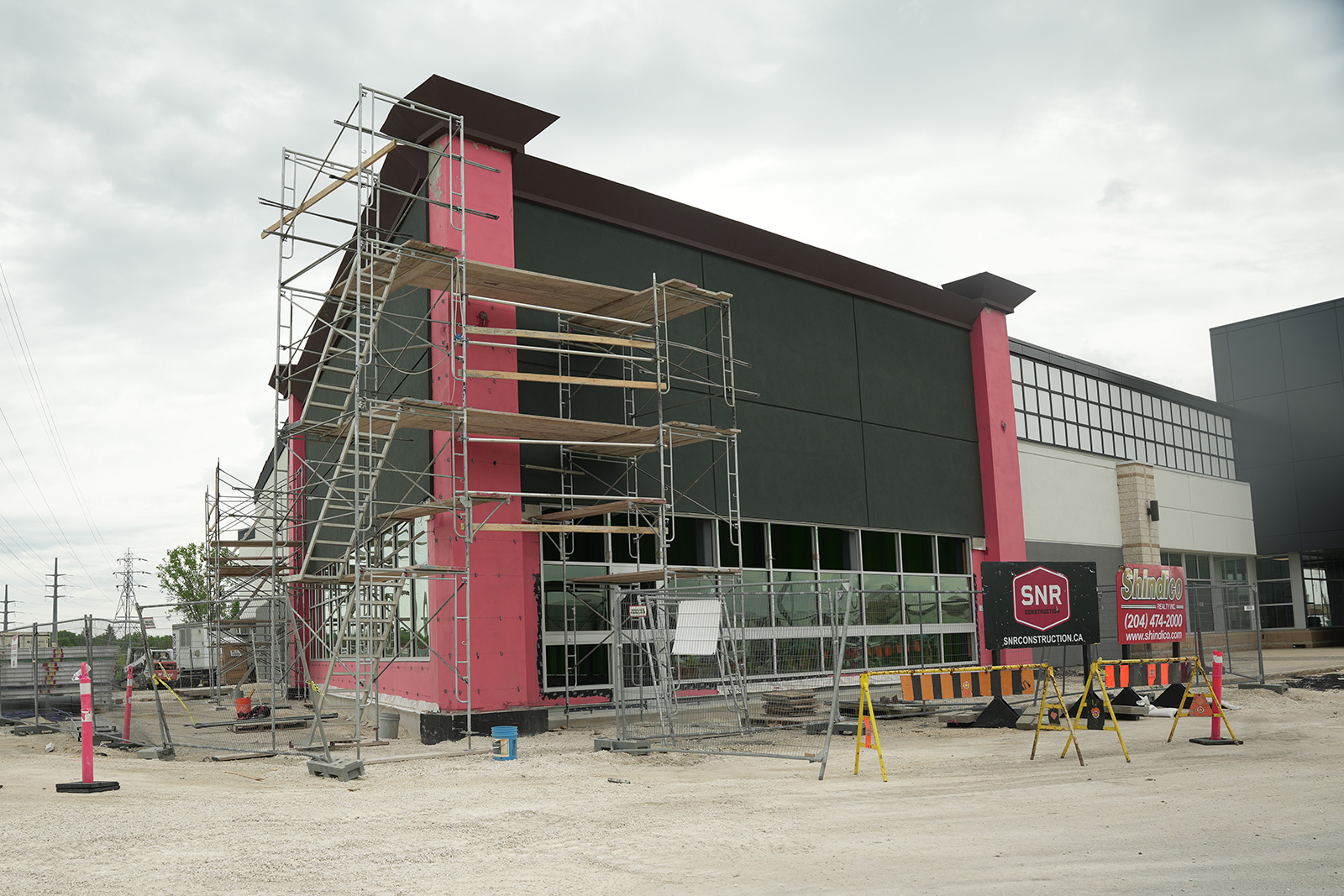 1148 Taylor - New Construction - EIFS, cornice and masonry towers in progress